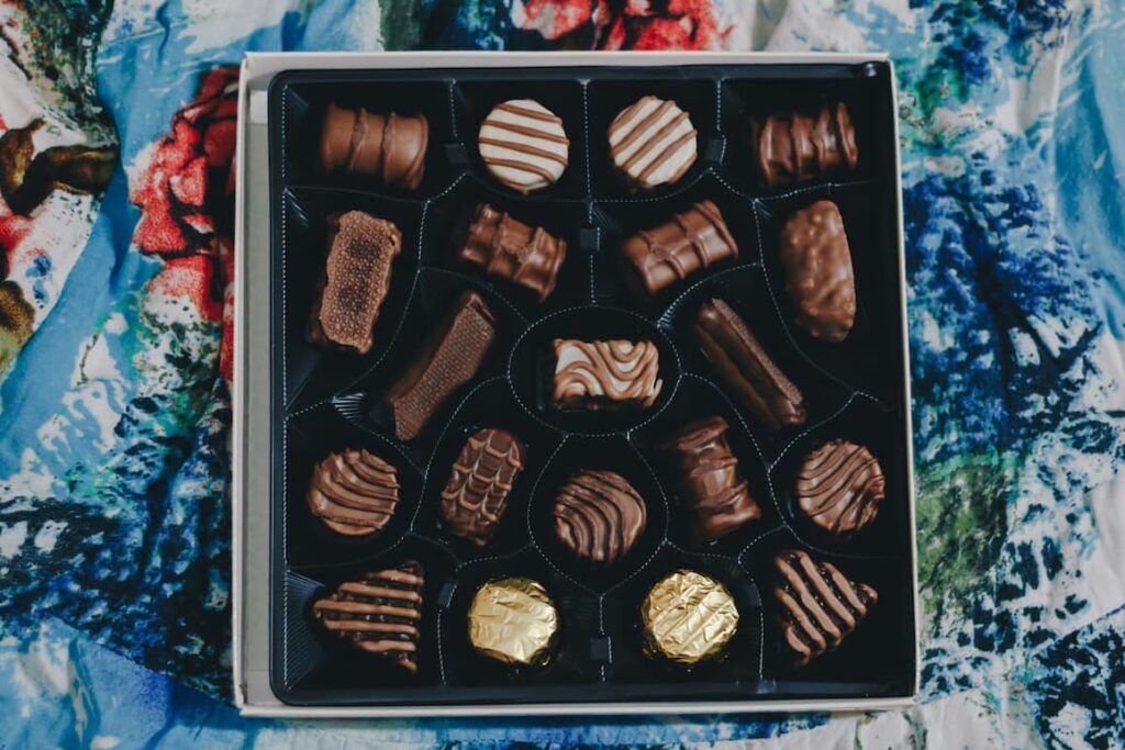 An assortment of chocolates in a box, similar to those you give to your partner when dating in Japan.