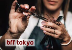 Woman cutting medium length brown hair at a hair salon in Tokyo